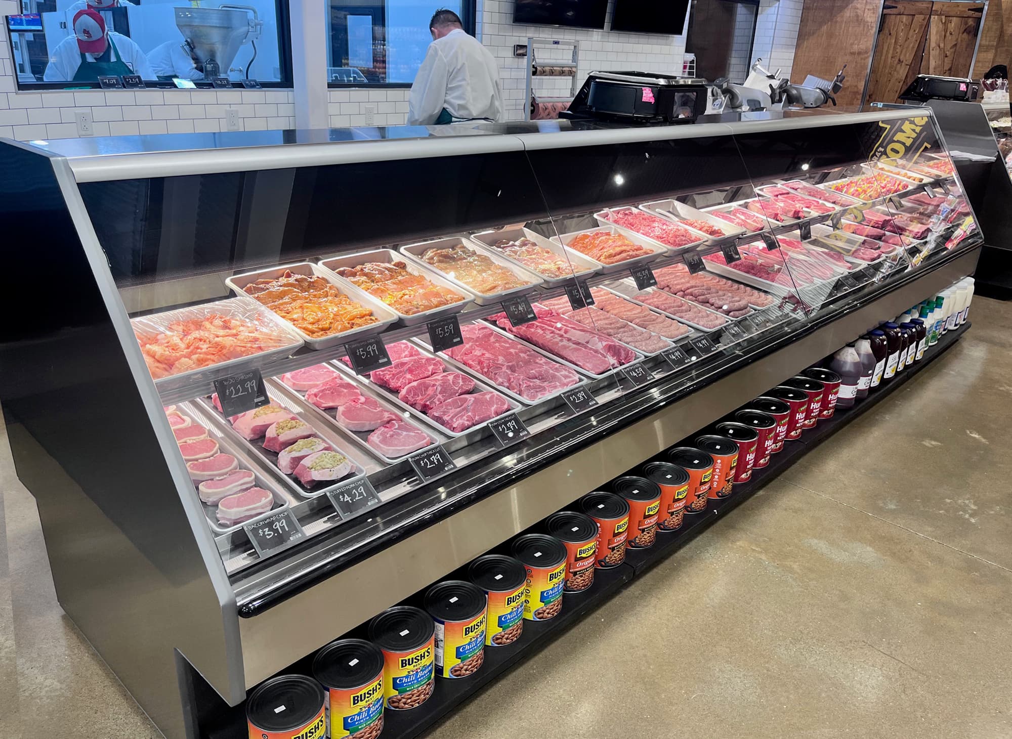 Fresh-cut beef and pork in the butcher case at Farm Country in Union, Missouri